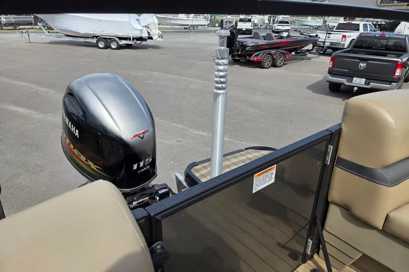 Slide: The Image of 2024 Starcraft EXS 1 boat with Yamaha 115 engine in a parking lot. - 17