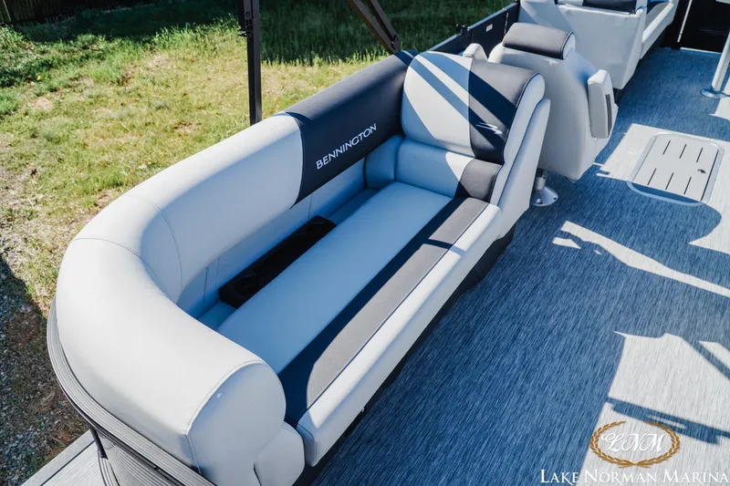 Slide: The Image of 2026 Bennington 22SSR boat interior with plush seating at Lake Norman Marina. - 6