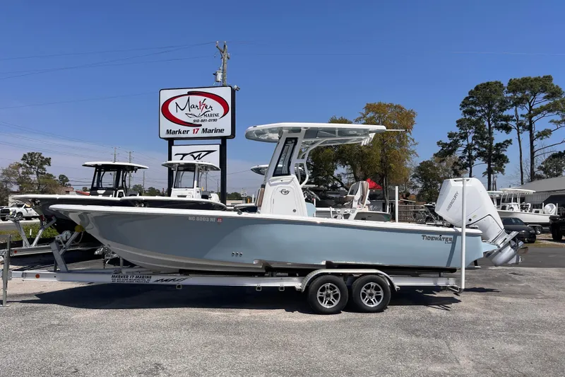 The Image of 2025 Tidewater 2500 Carolina Bay boat on trailer at Marker 17 Marine dealership. - 0