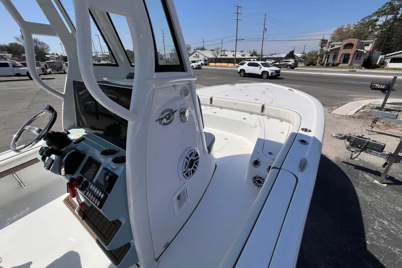 Slide: The Image of 2025 Tidewater 2500 Carolina Bay boat, showcasing sleek design and modern console features. - 9