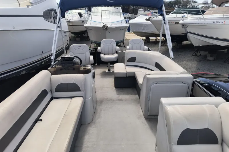 Slide: The Image of 2018 Crest I Fish 220 C4 pontoon boat with spacious seating and canopy. - 9