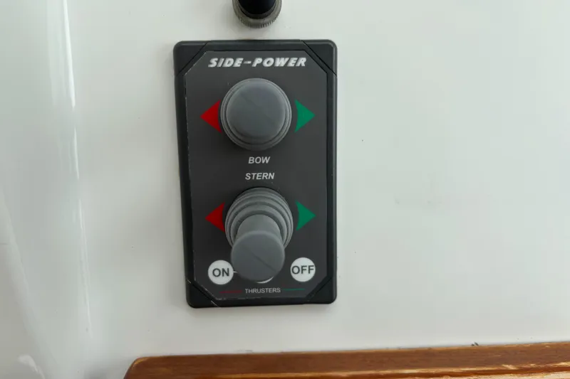 Slide: The Image of Control panel for Side-Power thrusters on 2006 MJM 34z Express HT boat. - 25