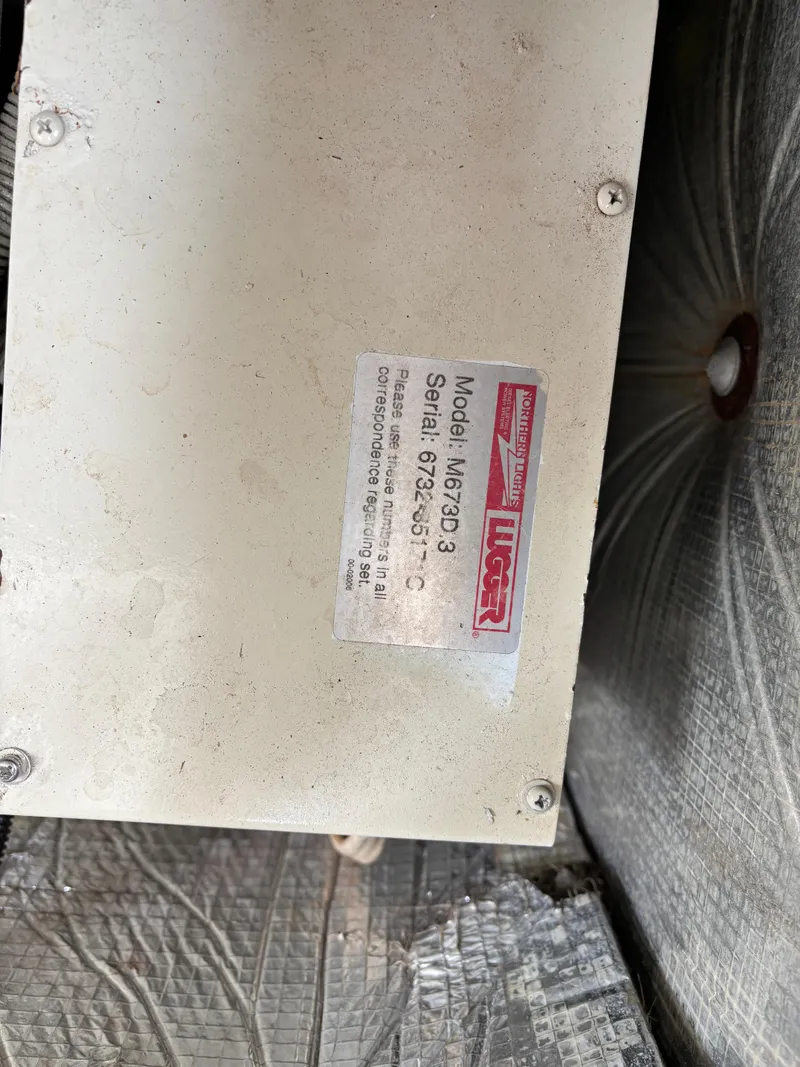 Slide: The Image of Label on industrial equipment with model and serial number details. - 41