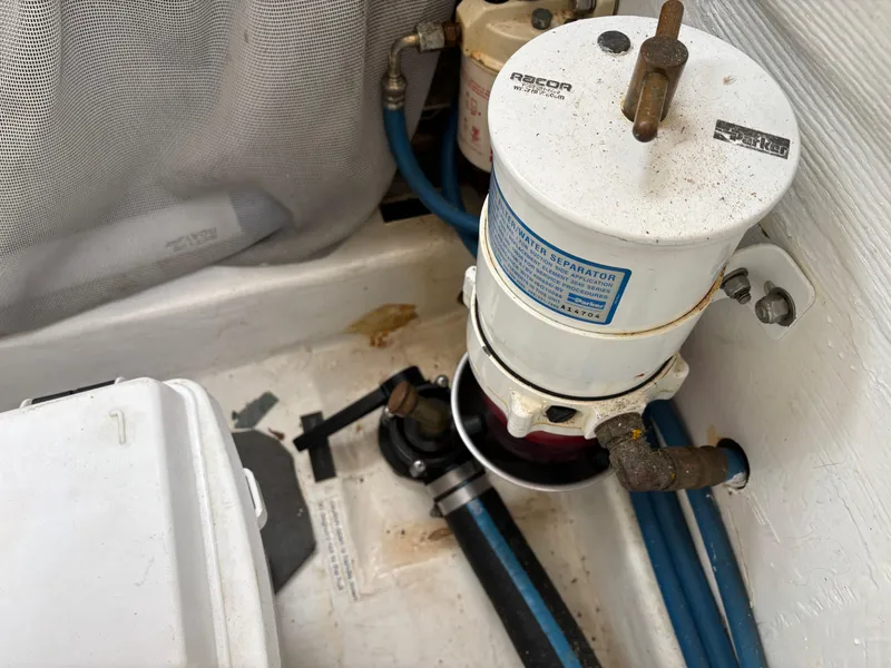 Slide: The Image of Fuel filter system in 2006 MJM 34z Express HT boat engine compartment. - 44