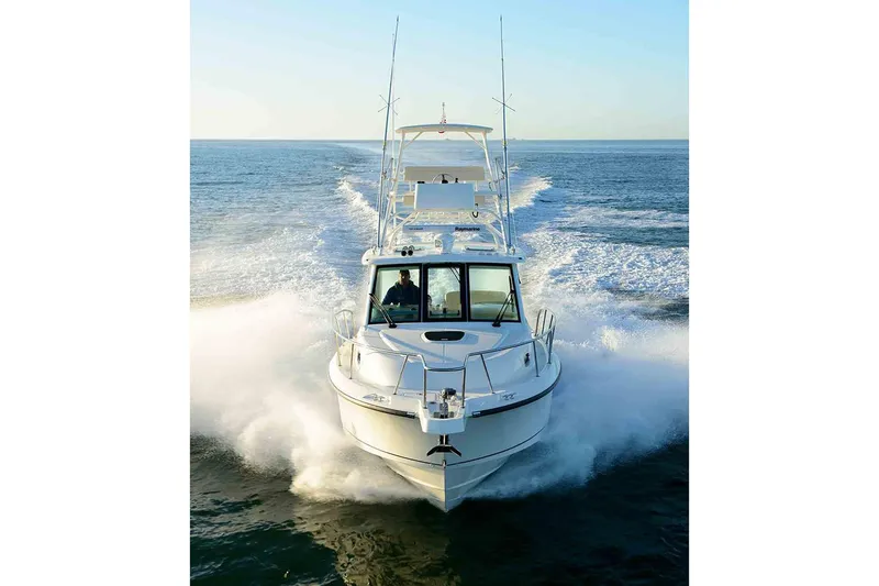 Slide: The Image of Manufacturer Provided Image: 2020 Boston Whaler 345 Conquest cruising on open water. - 3