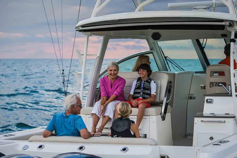 Slide: The Image of Manufacturer Provided Image: 2020 Boston Whaler 345 Conquest fishing boat with triple 300 HP engines on open sea. - 5