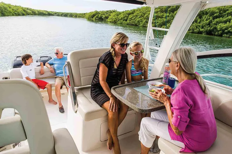 Slide: The Image of Manufacturer Provided Image: Family enjoying a day on a 2020 Boston Whaler 345 Conquest boat. - 6