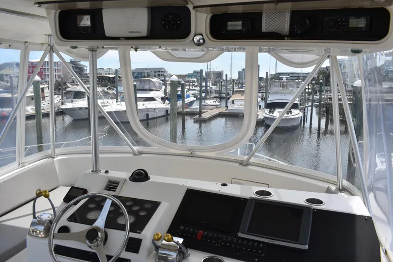 Slide: The Image of Cockpit view of 1998 Ocean Yachts 40 Super Sport in marina setting. - 14