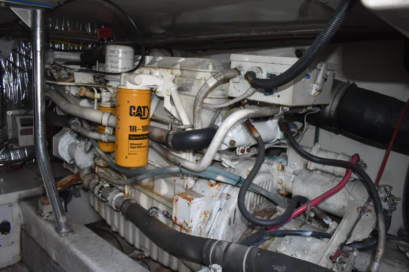 Slide: The Image of Engine room of a 1998 Ocean Yachts 40 Super Sport with CAT engine components. - 41