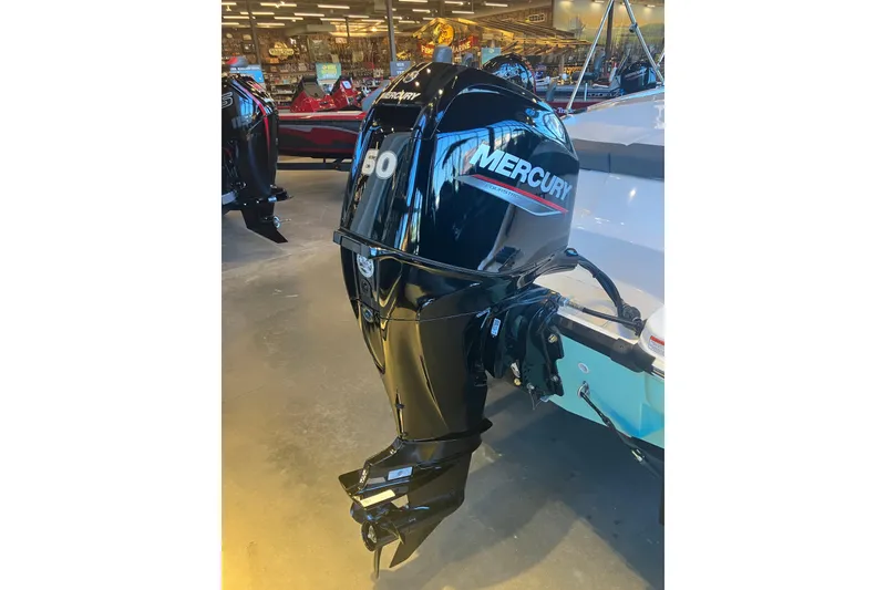 Slide: The Image of 2026 Tahoe T16 boat with Mercury 60 outboard motor in showroom. - 4