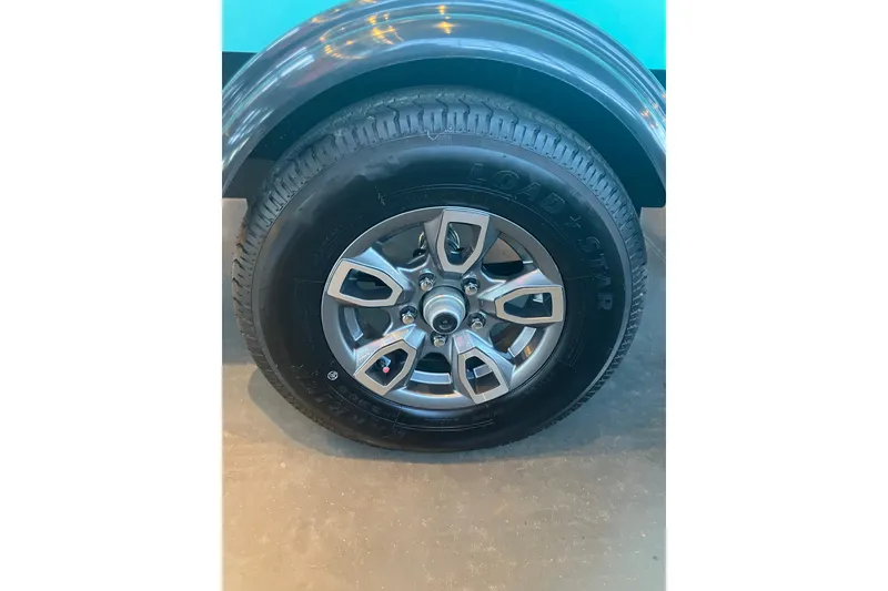 Slide: The Image of 2026 Tahoe T16 wheel with alloy rim and Load Star tire. - 10