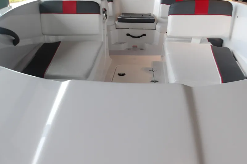 Slide: The Image of 2026 Tahoe T16 boat interior with white and red seating, modern design. - 9