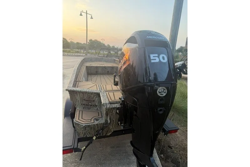Slide: The Image of 2026 Tracker Grizzly 1650 T Prairie Wings Edition boat with Mercury 50 outboard motor. - 4