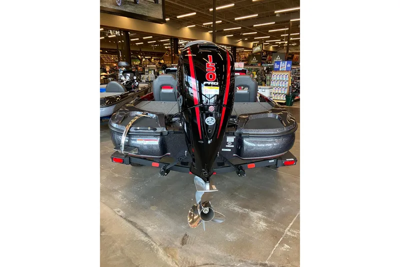 Slide: The Image of 2026 Nitro Z18 boat with powerful 150 HP engine displayed in showroom. - 4