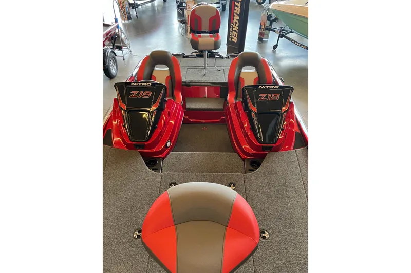 Slide: The Image of 2026 Nitro Z18 boat interior with dual seats and sleek design. - 8
