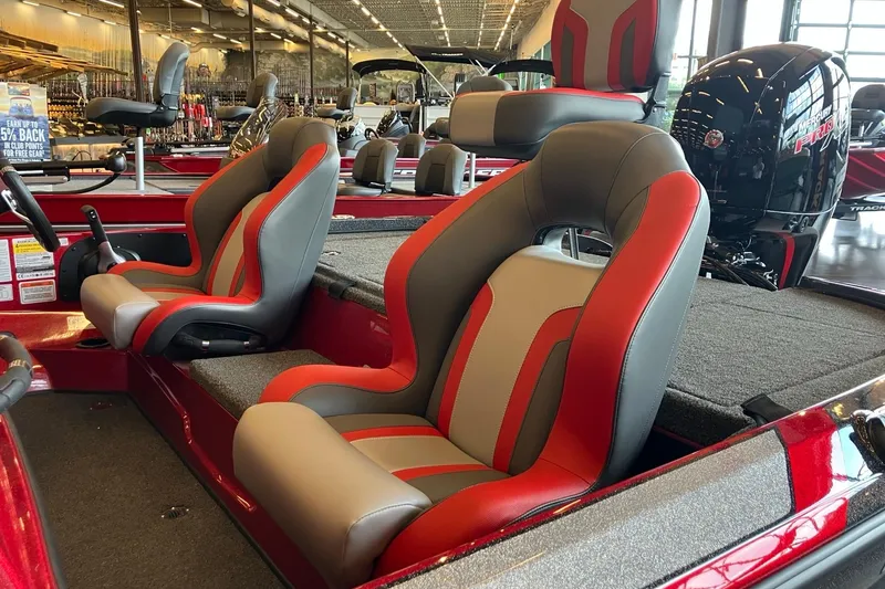 Slide: The Image of Interior of a 2026 Nitro Z18 boat with red and gray seating. - 2