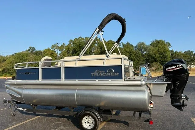 Slide: The Image of 2026 Sun Tracker Bass Buggy 16 XL Select pontoon boat with Mercury outboard motor. - 25