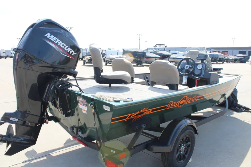 Slide: The Image of 2026 Tracker Bass Tracker Classic Limited boat with Mercury engine on trailer. - 44