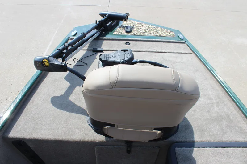 Slide: The Image of 2026 Tracker Bass Tracker Classic Limited boat deck with seat and trolling motor. - 50