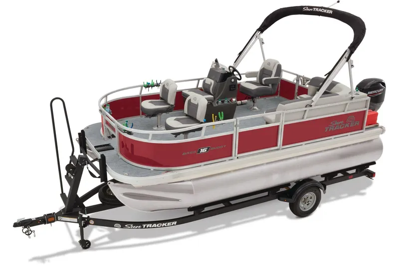 Slide: The Image of 2026 Sun Tracker Bass Buggy 16 XL Select pontoon boat on trailer, sunny day. - 5