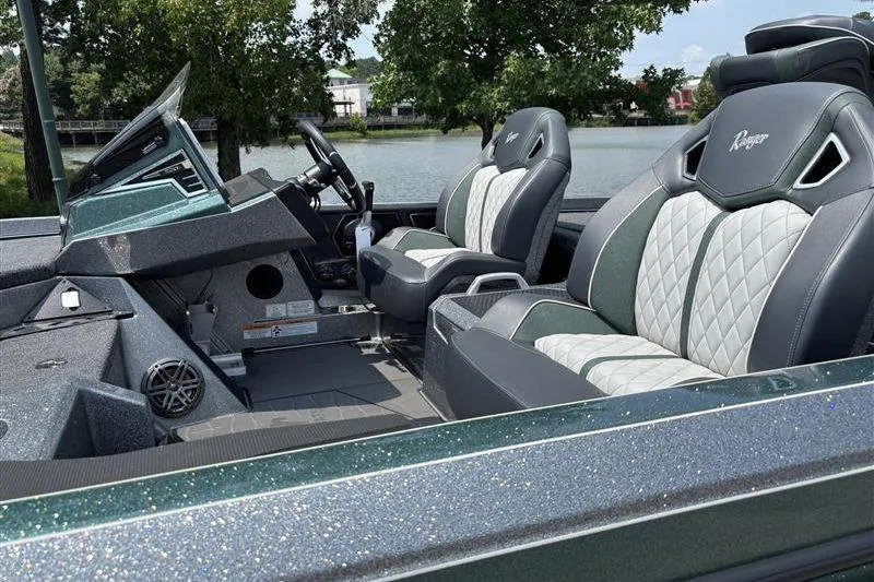 Slide: The Image of 2026 Ranger Z520R Cup-Equipped boat interior with luxurious seating and sleek dashboard design. - 8