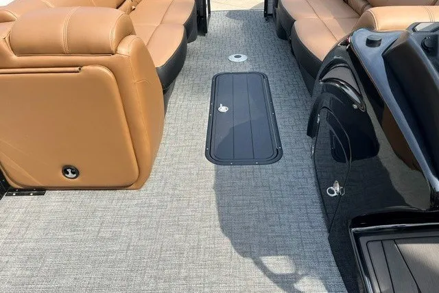 Slide: The Image of Luxurious interior of 2026 Regency 250 DL boat with tan leather seating. - 11