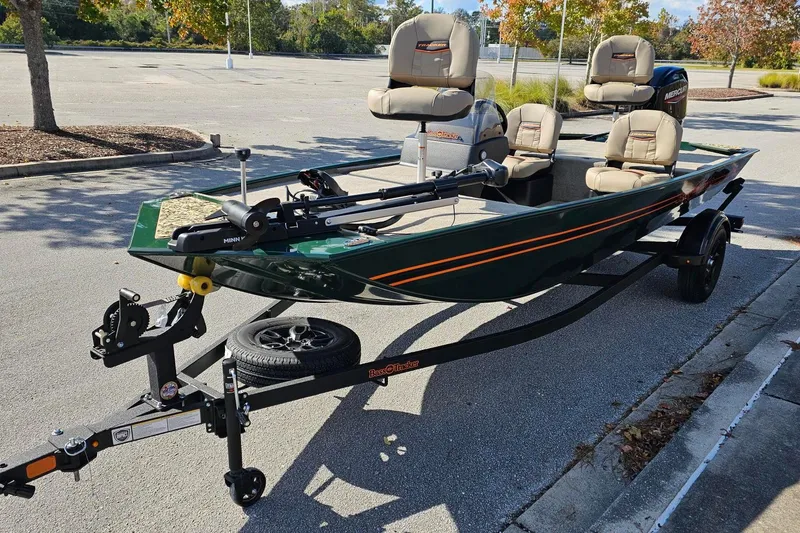 Slide: The Image of 2026 Tracker Bass Tracker Classic Limited boat on trailer in parking lot. - 4