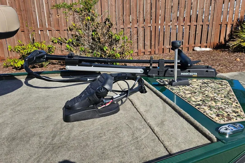 Slide: The Image of 2026 Tracker Bass Tracker Classic Limited with Minn Kota trolling motor on deck. - 7