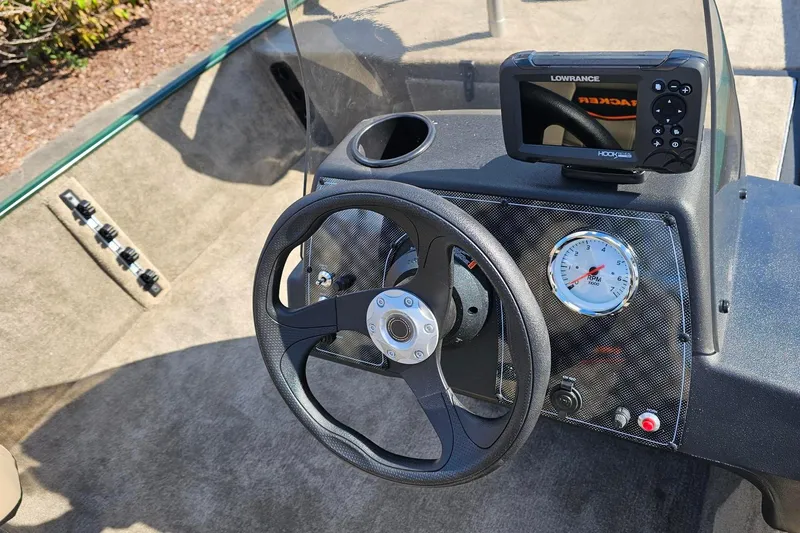Slide: The Image of Steering console of 2026 Tracker Bass Tracker Classic Limited with Lowrance fish finder. - 8