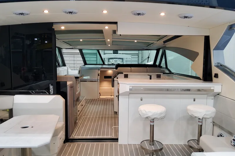 Slide: The Image of Luxurious interior of 2026 Formula 500 Super Sport Crossover yacht with modern seating and lighting. - 10