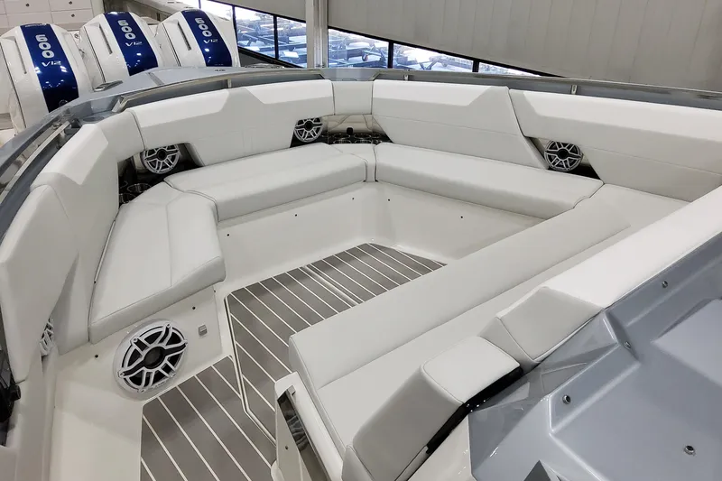 Slide: The Image of 2026 Formula 500 Super Sport Crossover boat interior with white seating and speakers. - 23