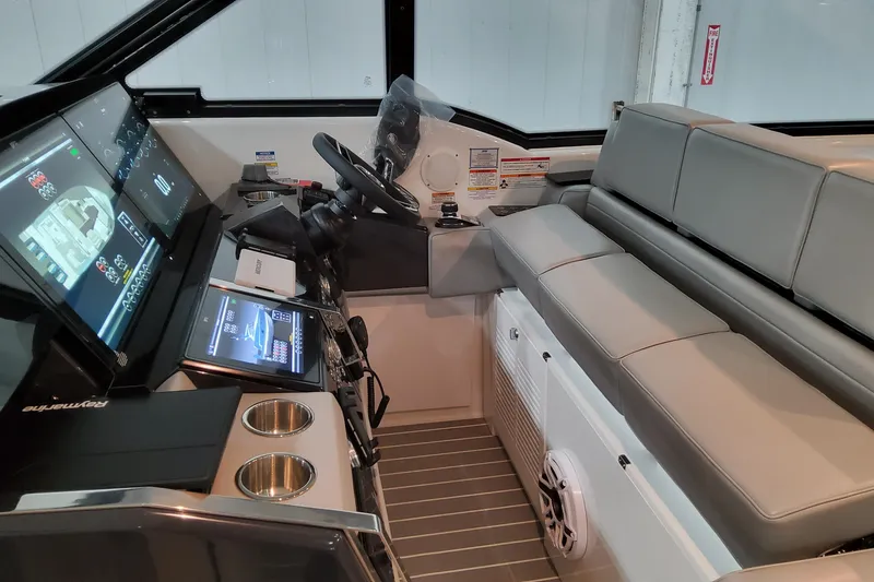 Slide: The Image of Interior of 2026 Formula 500 Super Sport Crossover boat with advanced navigation displays. - 28