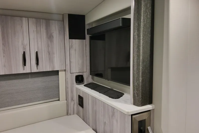 Slide: The Image of Interior of 2026 Formula 500 Super Sport Crossover with modern cabinetry and sleek design. - 36