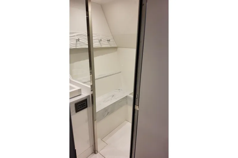 Slide: The Image of Interior of 2026 Formula 500 Super Sport Crossover, featuring sleek modern bathroom design. - 39