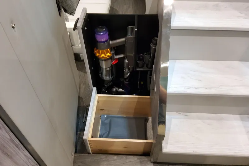 Slide: The Image of Hidden vacuum storage under stairs in 2026 Formula 500 Super Sport Crossover. - 42