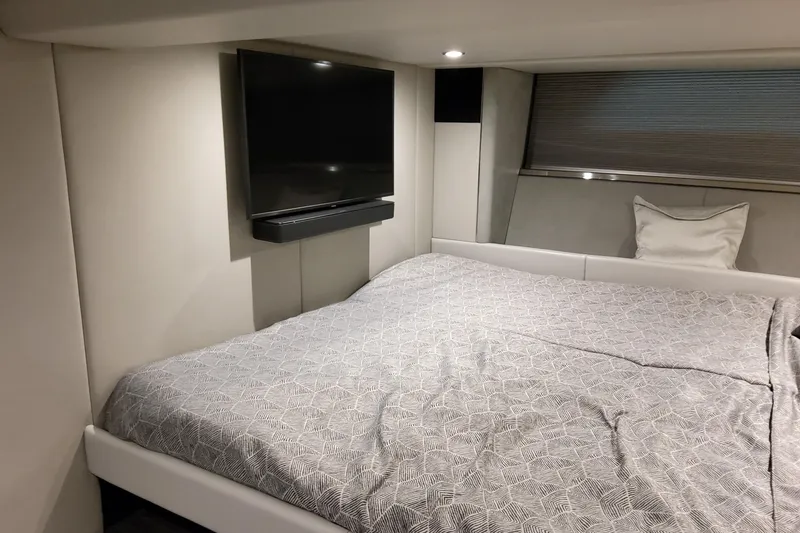 Slide: The Image of Luxurious cabin interior of 2026 Formula 500 Super Sport Crossover with bed and TV. - 45