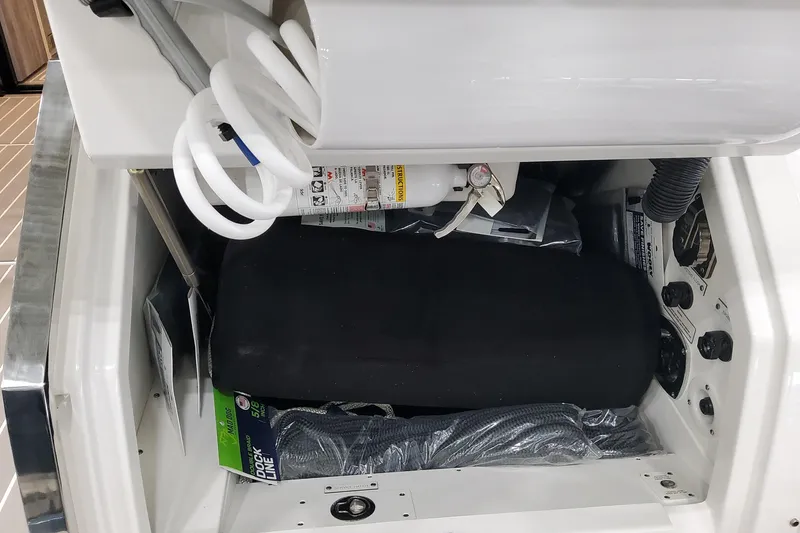 Slide: The Image of Interior compartment of 2026 Formula 500 Super Sport Crossover, featuring equipment and storage. - 49