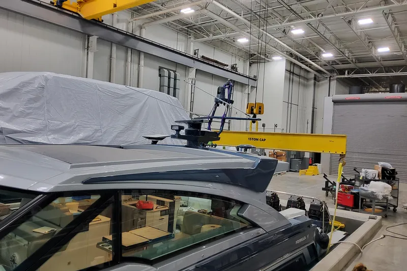 Slide: The Image of 2026 Formula 500 Super Sport Crossover in a modern industrial workshop setting. - 5