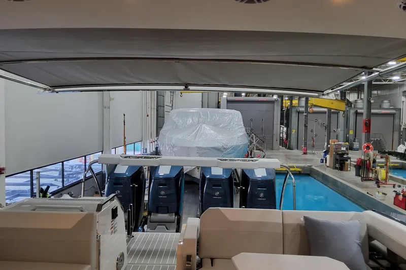 Slide: The Image of 2026 Formula 500 Super Sport Crossover in a modern indoor facility with multiple engines. - 51