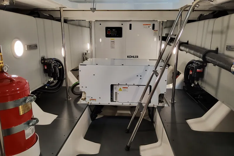 Slide: The Image of Engine room of 2026 Formula 500 Super Sport Crossover with Kohler generator and safety equipment. - 53