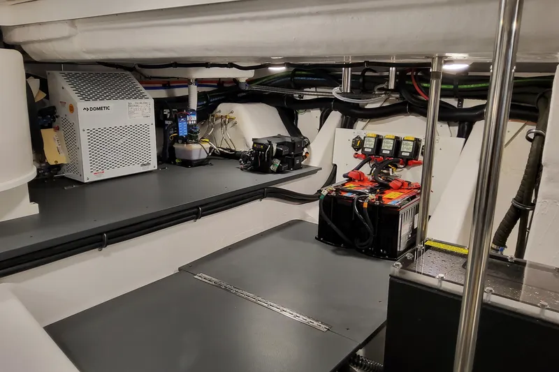 Slide: The Image of Engine room of 2026 Formula 500 Super Sport Crossover with advanced equipment and battery setup. - 56