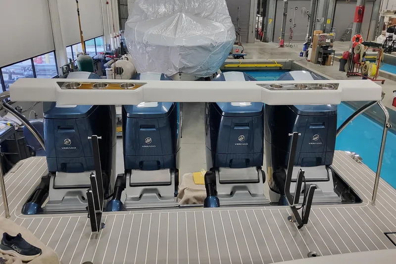 Slide: The Image of 2026 Formula 500 Super Sport Crossover with triple Verado engines in a workshop setting. - 6