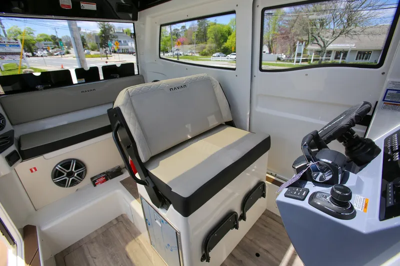 Slide: The Image of Interior of 2026 Navan C30 boat with modern seating and control panel. - 17