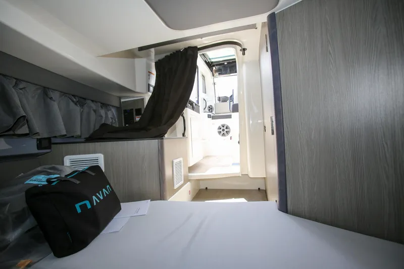 Slide: The Image of Interior view of 2026 Navan C30 cabin with modern design and storage. - 24