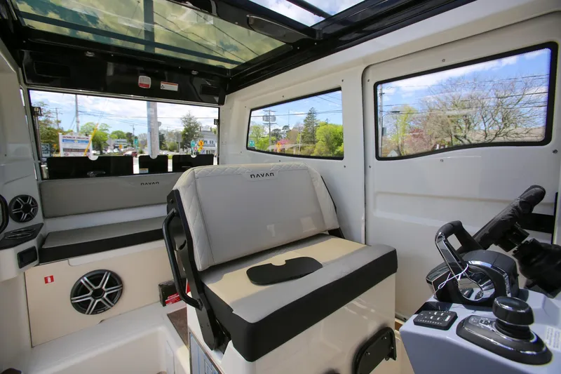 Slide: The Image of Interior of 2026 Navan C30 boat with modern seating and control panel. - 25