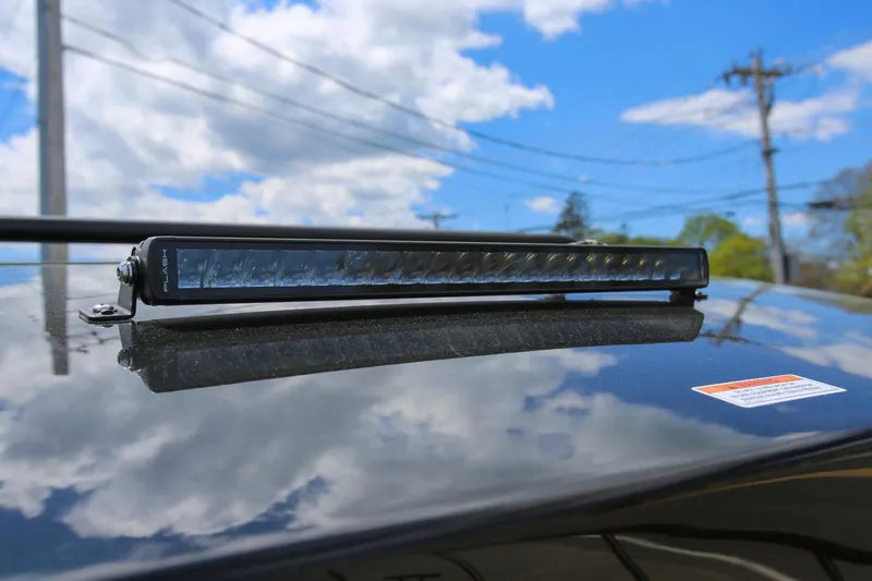 Slide: The Image of Rooftop light bar on 2026 Navan C30 under a cloudy sky. - 27