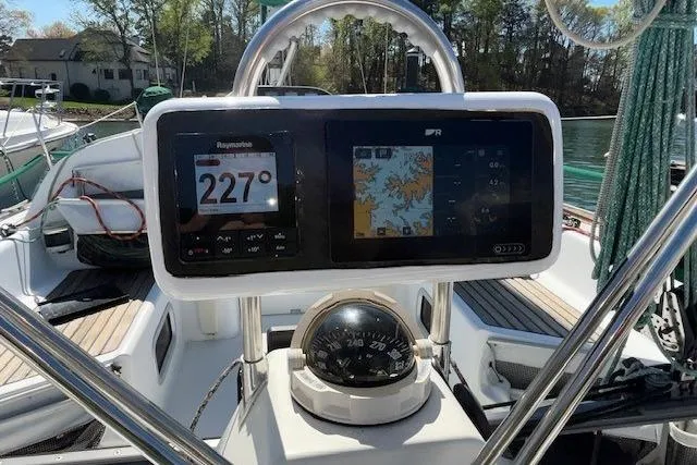 Slide: The Image of Cockpit of 2005 Beneteau First 36.7 sailboat with navigation instruments and compass. - 19