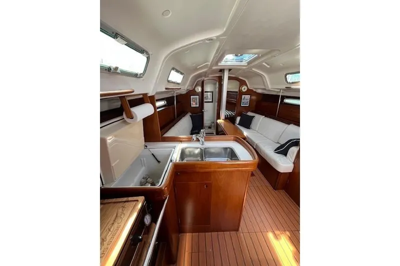 Slide: The Image of Interior of 2005 Beneteau First 36.7 yacht with wood finish and modern amenities. - 24