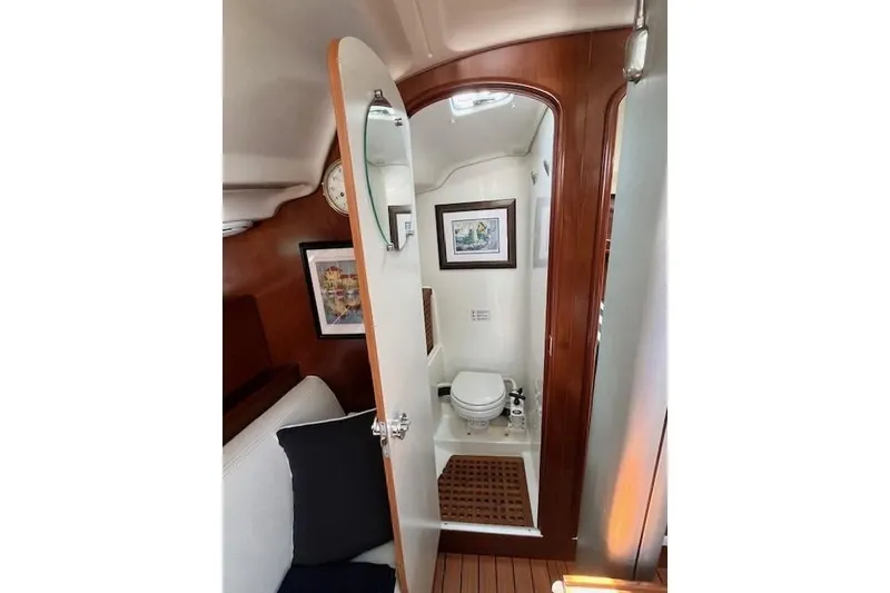 Slide: The Image of Interior of 2005 Beneteau First 36.7 yacht showing bathroom with wooden accents. - 26