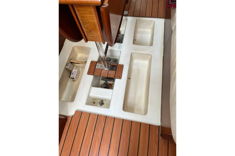Slide: The Image of Interior view of a 2005 Beneteau First 36.7 sailboat, showcasing storage compartments. - 28